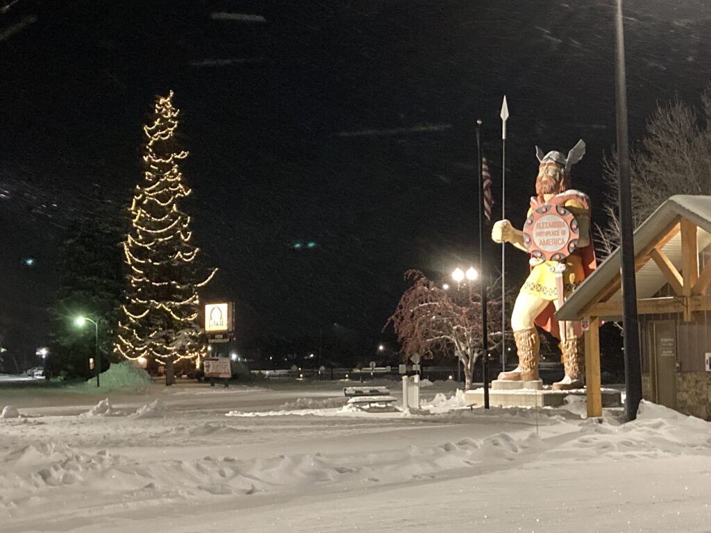 Big Ole appears next to one of the Alexandria MN Area's tallest decorated Christmas trees.